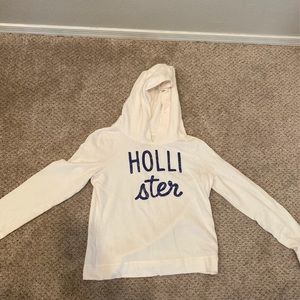 White Hollister sweater.